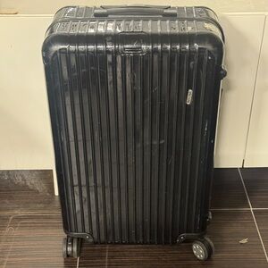 Rimowa Hard-Shell Spinner Suitcase Check on
